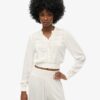Blouse met lange mouwen, kanten rand en smockwerk Blouse met lange mouwen, kanten rand en smockwerk