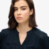 Blouse met lange mouwen, kanten rand en smockwerk