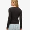 Essentiële top met lange mouwen en knoopsluiting