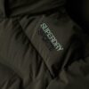 Hooded lange gewatteerde jas met capuchon Hooded lange gewatteerde jas met capuchon