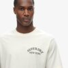 Losvallend T-shirt met tattoo-afbeelding op de rug Losvallend T-shirt met tattoo-afbeelding op de rug