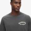 Losvallend T-shirt met tattoo-afbeelding op de rug Losvallend T-shirt met tattoo-afbeelding op de rug