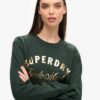 Luxe jersey jurk met metallic logo Luxe jersey jurk met metallic logo
