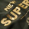 Luxe T-shirt met metallic logo Luxe T-shirt met metallic logo