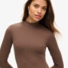 Mini-jurk met hoge hals en lange mouwen van jersey