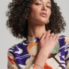 Mini-jurk met lange mouwen en print Mini-jurk met lange mouwen en print