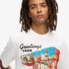 T-shirt met reispostkaart-print