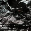 T-shirtjurk met hoge hals en pailletten