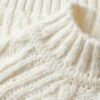 Trui met hoge hals en kabelpatroon uit gebreide kleding